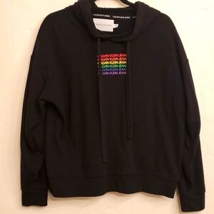 Calvin Klein  black cropped hoodie with rainbow label.